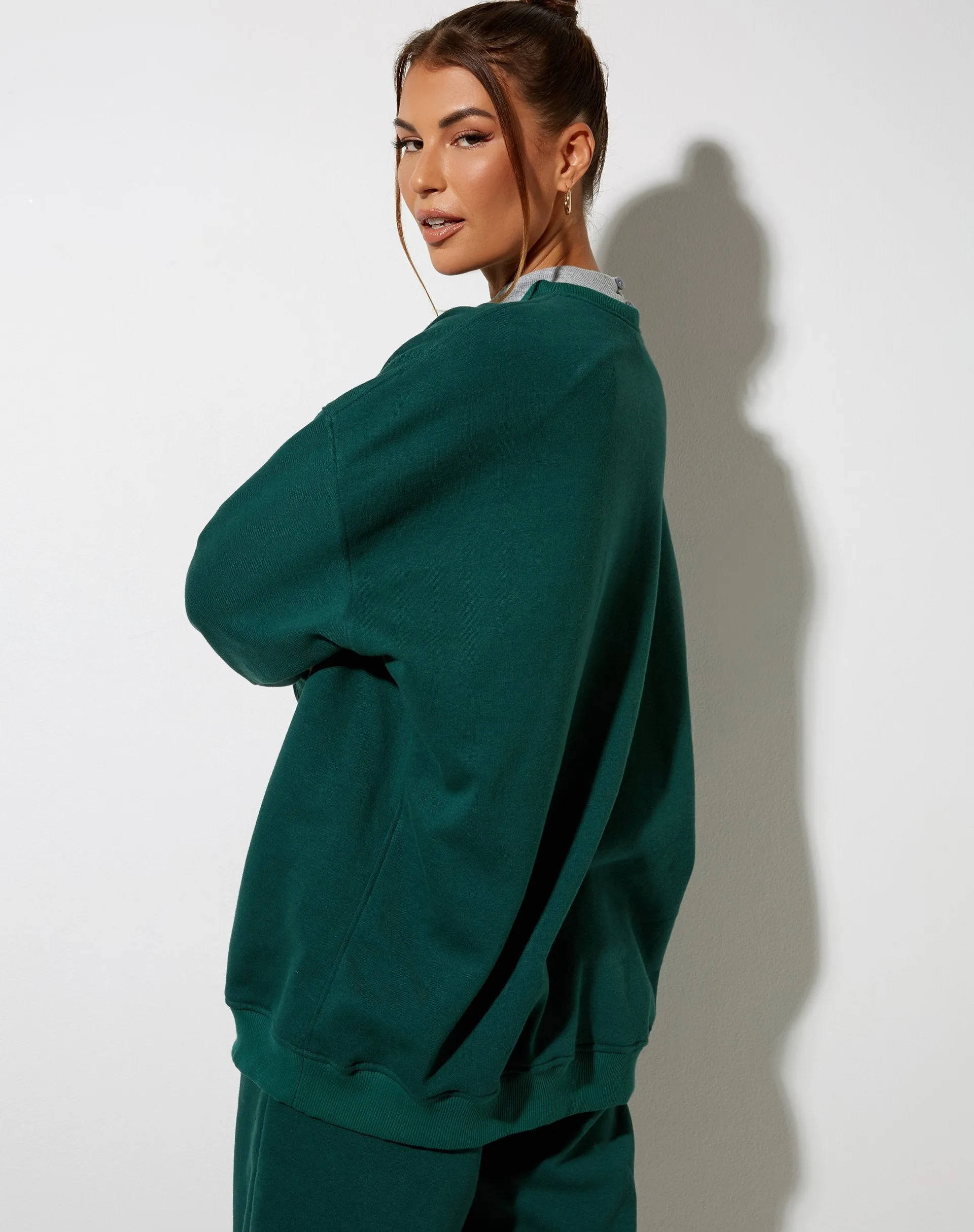 Glo Sweatshirt in Bottle Green with 'Angel' Embro in White