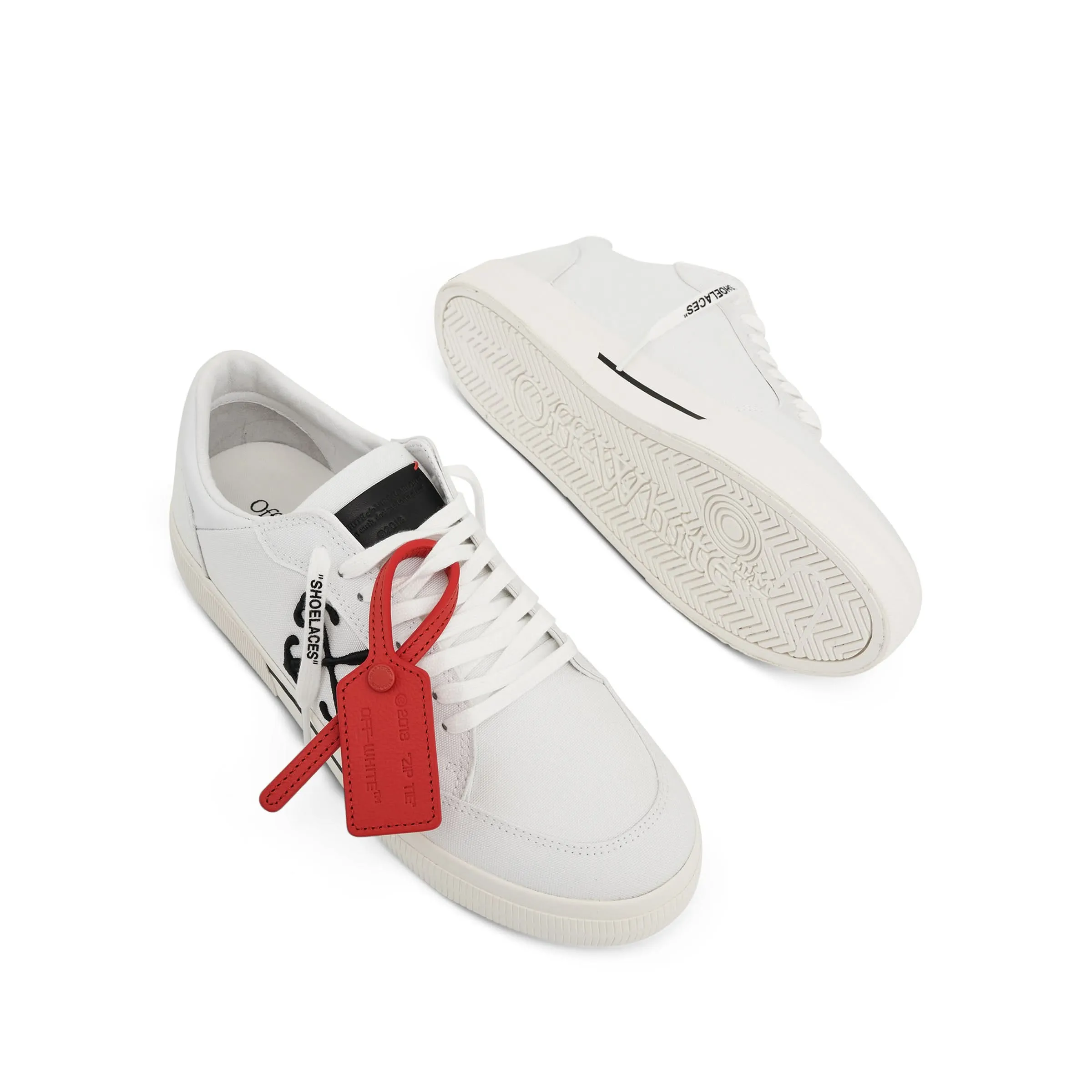 New Low Vulcanized Canvas Sneaker in White/Black